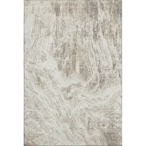 Photo of Taupe And Beige Abstract Washable Area Rug With UV Protection