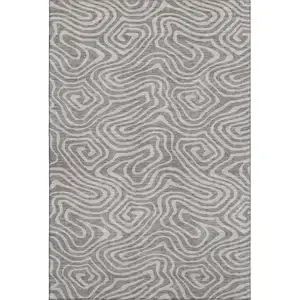 Photo of Taupe And Beige Abstract Washable Area Rug With UV Protection