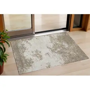 Photo of Taupe And Beige Abstract Washable Indoor Outdoor Area Rug