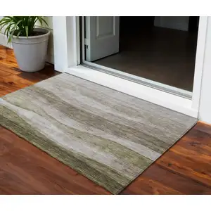 Photo of Taupe And Beige Abstract Washable Indoor Outdoor Area Rug