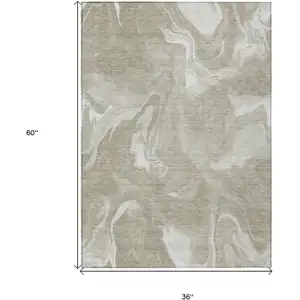 Photo of Taupe And Beige Abstract Washable Indoor Outdoor Area Rug