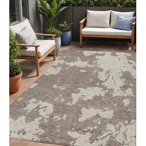 Photo of Taupe And Beige Abstract Washable Indoor Outdoor Area Rug