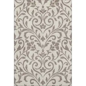 Photo of Taupe And Beige Floral Washable Area Rug With UV Protection