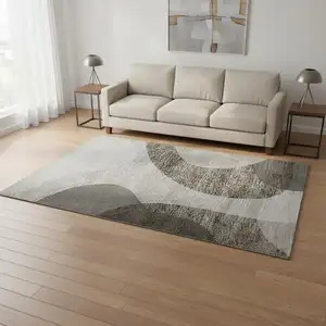 Photo of Taupe And Beige Geometric Washable Area Rug With UV Protection