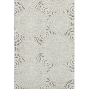 Photo of Taupe And Beige Geometric Washable Area Rug With UV Protection