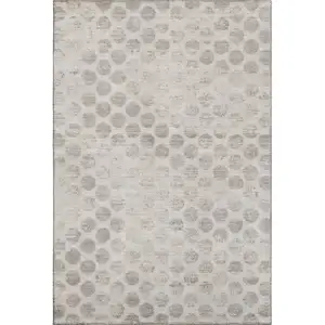 Photo of Taupe And Beige Geometric Washable Area Rug With UV Protection