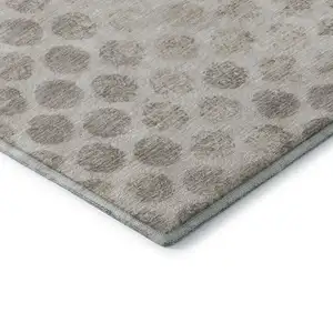 Photo of Taupe And Beige Geometric Washable Area Rug With UV Protection
