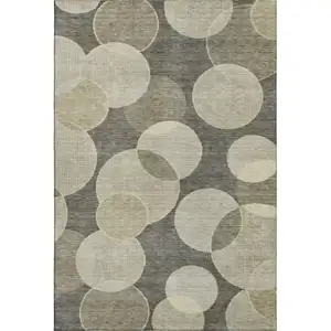 Photo of Taupe And Beige Geometric Washable Area Rug With UV Protection