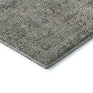 Photo of Taupe And Beige Geometric Washable Area Rug With UV Protection