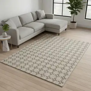 Photo of Taupe And Beige Geometric Washable Area Rug With UV Protection