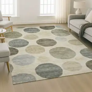 Photo of Taupe And Beige Geometric Washable Area Rug With UV Protection