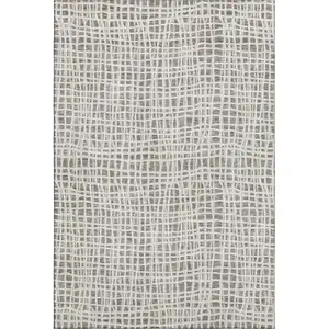 Photo of Taupe And Beige Striped Washable Area Rug With UV Protection