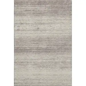 Photo of Taupe And Beige Striped Washable Area Rug With UV Protection