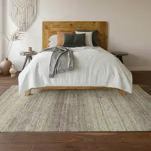 Photo of Taupe And Beige Striped Washable Area Rug With UV Protection