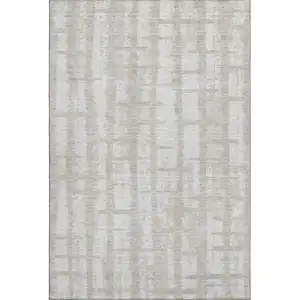 Photo of Taupe And Beige Striped Washable Area Rug With UV Protection