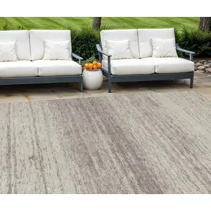 Photo of Taupe And Beige Striped Washable Indoor Outdoor Area Rug