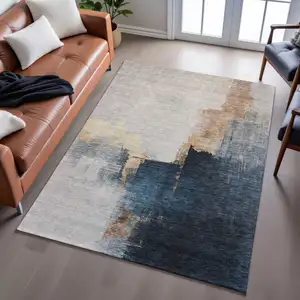 Photo of Taupe And Blue Abstract Washable Area Rug With UV Protection