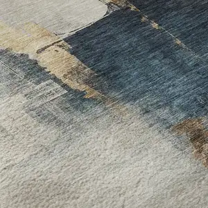 Photo of Taupe And Blue Abstract Washable Area Rug With UV Protection