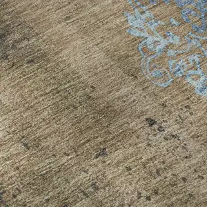 Photo of Taupe And Blue Floral Washable Area Rug With UV Protection
