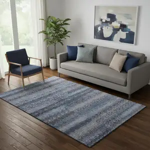Photo of Taupe And Blue Striped Washable Area Rug With UV Protection