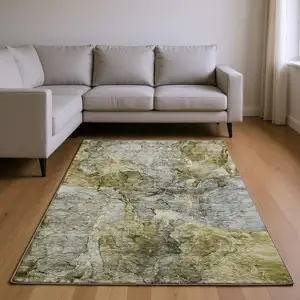 Photo of Taupe And Brown Abstract Washable Area Rug With UV Protection
