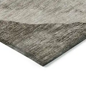 Photo of Taupe And Brown Abstract Washable Indoor Outdoor Area Rug