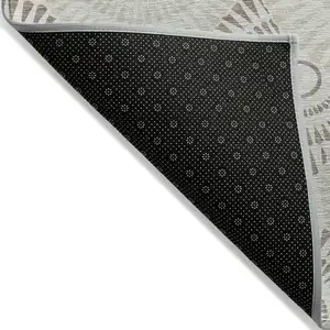 Photo of Taupe And Brown Geometric Washable Indoor Outdoor Area Rug