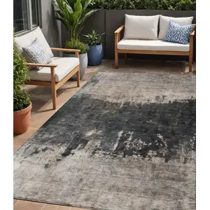 Photo of Taupe And Charcoal Abstract Washable Indoor Outdoor Area Rug