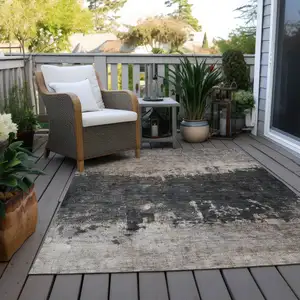 Photo of Taupe And Charcoal Abstract Washable Indoor Outdoor Area Rug