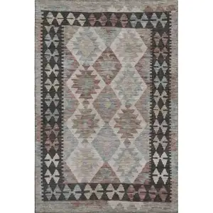 Photo of Taupe And Charcoal Tribal Washable Area Rug With UV Protection