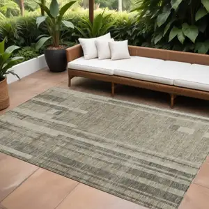 Photo of Taupe And Dark Gray Striped Washable Indoor Outdoor Area Rug