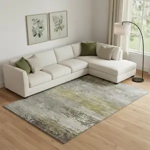 Photo of Taupe And Gold Abstract Washable Area Rug With UV Protection