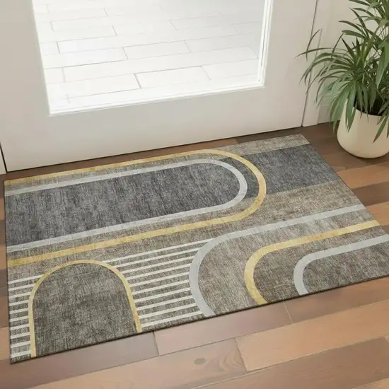 Taupe And Gold Geometric Washable Area Rug With UV Protection Photo 1