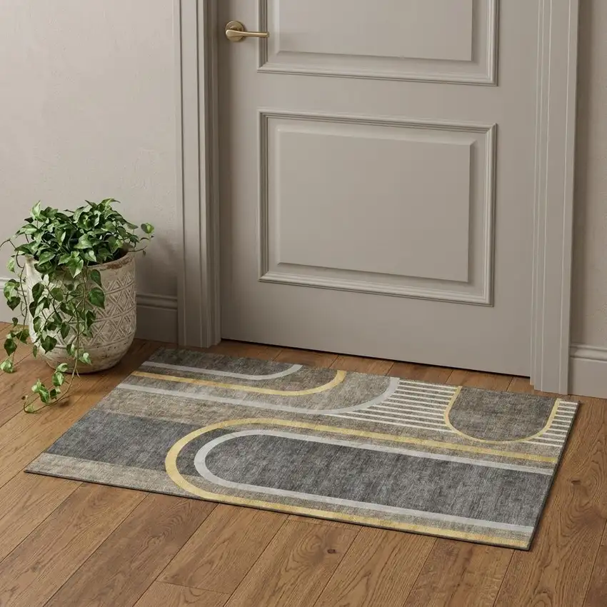 Taupe And Gold Geometric Washable Area Rug With UV Protection Photo 1