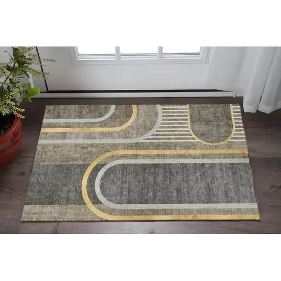 Taupe And Gold Geometric Washable Area Rug With UV Protection Photo 2