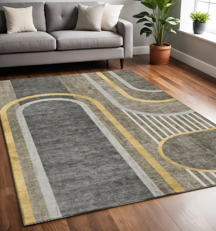 Taupe And Gold Geometric Washable Area Rug With UV Protection Photo 2