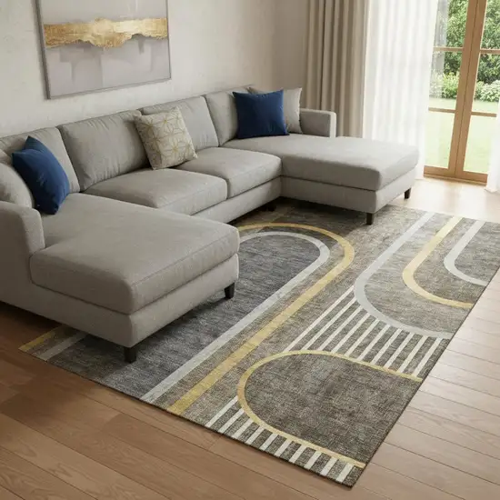 Taupe And Gold Geometric Washable Area Rug With UV Protection Photo 1