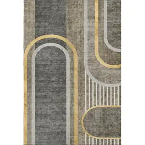 Photo of Taupe And Gold Geometric Washable Area Rug With UV Protection