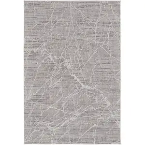 Photo of Taupe And Gray Abstract Power Loom Distressed Stain Resistant Area Rug