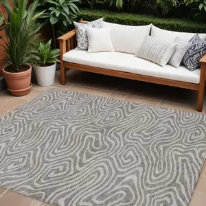 Photo of Taupe And Gray Abstract Washable Indoor Outdoor Area Rug