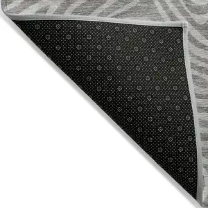 Photo of Taupe And Gray Abstract Washable Indoor Outdoor Area Rug