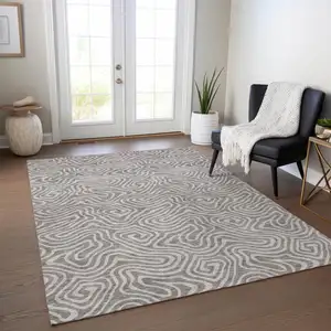 Photo of Taupe And Gray Abstract Washable Indoor Outdoor Area Rug