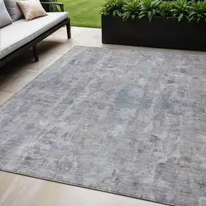 Photo of Taupe And Gray Abstract Washable Indoor Outdoor Area Rug