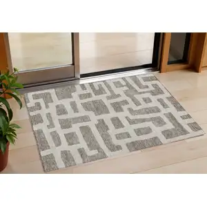 Photo of Taupe And Gray Abstract Washable Indoor Outdoor Area Rug
