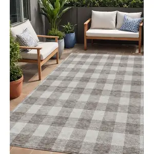 Photo of Taupe And Gray Plaid Washable Indoor Outdoor Area Rug