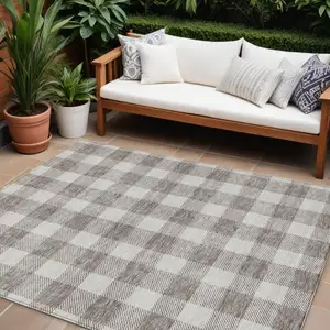 Photo of Taupe And Gray Plaid Washable Indoor Outdoor Area Rug