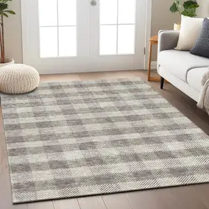 Photo of Taupe And Gray Plaid Washable Indoor Outdoor Area Rug