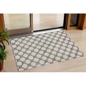 Photo of Taupe And Gray Polka Dot Washable Indoor Outdoor Area Rug