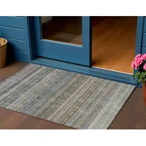 Photo of Taupe And Green Striped Washable Indoor Outdoor Area Rug