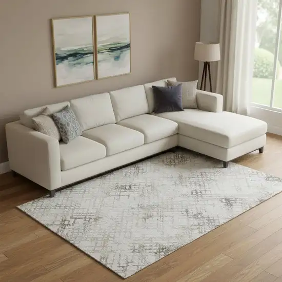 Taupe And Ivory Abstract Geometric Washable Area Rug With UV Protection Photo 1